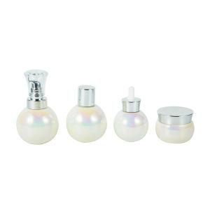 Customized Color Round Shape 40ml 120ml 150ml Skin Care Serum Lotion Ceramic Whiteware Bottle with Silver Pump