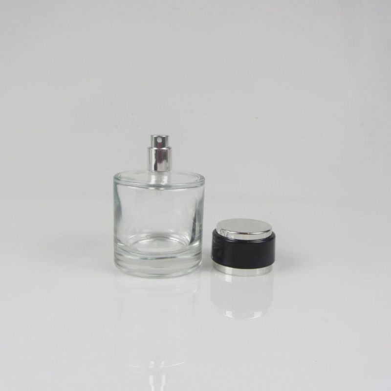 China Wholesale Logo Custom Mini Round Perfume Bottle with Cap