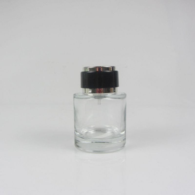 China Wholesale Logo Custom Mini Round Perfume Bottle with Cap