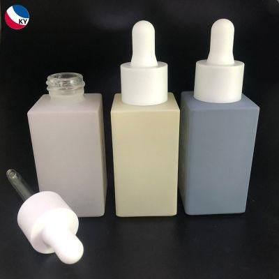 1oz Custom Yellow Essential Oil Serum Flat Shoulder Frosted Clear Glass Dropper Bottle with Pipette