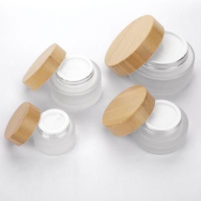 Wholesale 1oz 15g 30g 50g 100g Empty Luxury Frosted Face Lotion Glass Cosmetic Cream Jar Container with Bamboo Lid