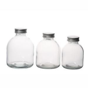 Hot Sale 250ml 350ml 500ml Round Screw Top Flint Customize Glass Bottles with Lids Manufacturers