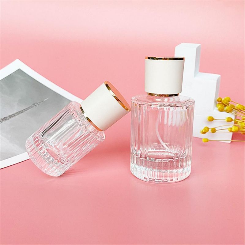 2022 New Design 30ml 50ml Luxury Glass Perfume Bottle Cylinder Shape Clear Spray Glass Screw Bottle
