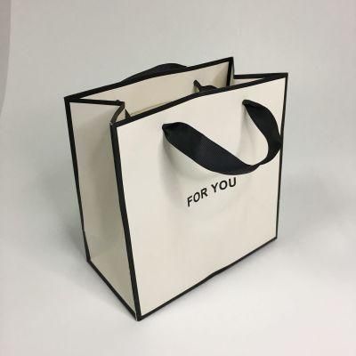 Custom Logo Pattern Gift Packing Paper Bag Strong Thick Paper Bag Fancy Paper Bag Rope Silk Handle Customizable