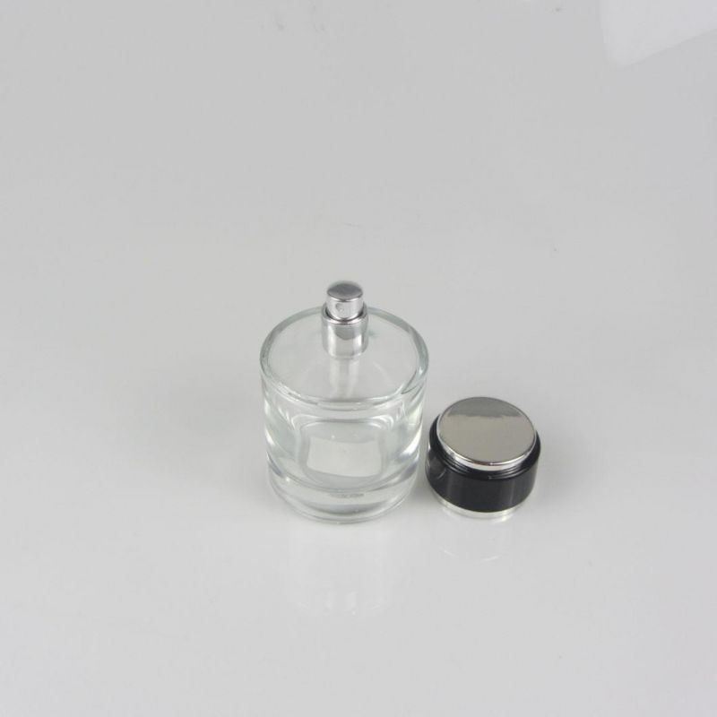 China Wholesale Logo Custom Mini Round Perfume Bottle with Cap