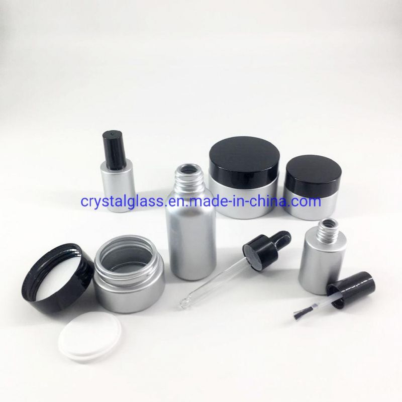 Customized Silver Color Cosmetic Bottle Set with Black Caps