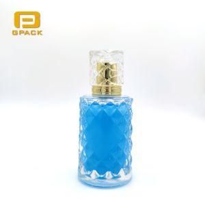 MID East Dubai Classic Design Shaped Perfume Bottle with Metal Label Mist Pump Sprayer Acrylic Surlyn Caps