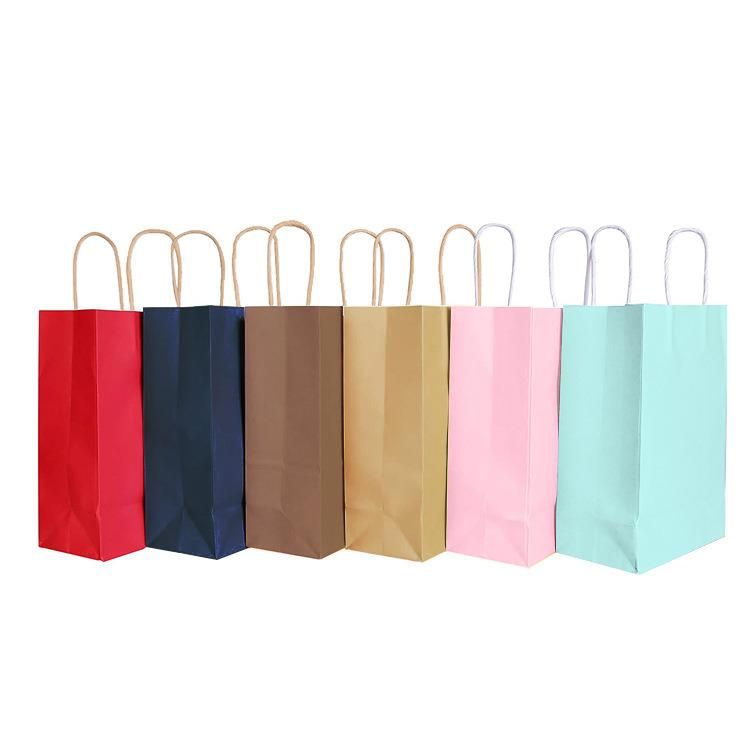 Wholesale Light Pink Kraft Paper Bag Custom Printed Logo Shopping Apparel Advertising Gift Bag Environmental Handbag
