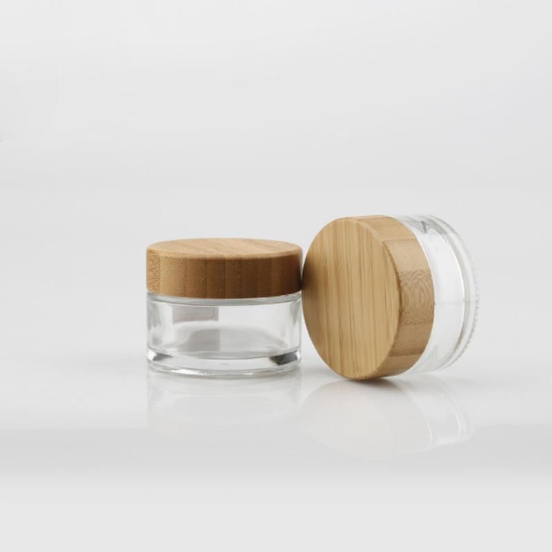 Eco Friendly Custom Logo Glass Cosmetic Jar 30g 50g Clear Frosted Glass Jars with Bamboo Wood Lid