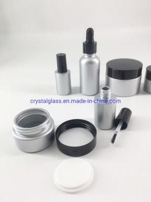 Customized Silver Color Cosmetic Bottle Set with Black Caps