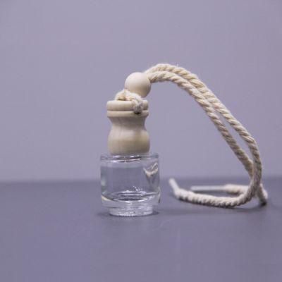 Low MOQ 5ml 6ml 7ml 8ml OEM Car Air Freshener Hanging Glass Perfume Wooden Cover Car Diffuser Bottle